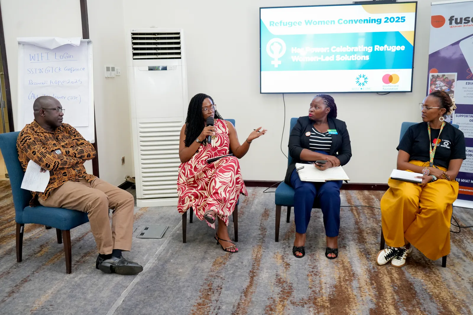 A panel of four speakers at the Refugee Women Convening 2025 in Kampala