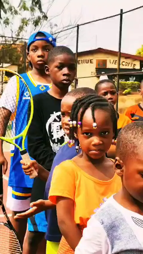 Children with their rackets at a BRIGHT tennis training session in Yaoundé